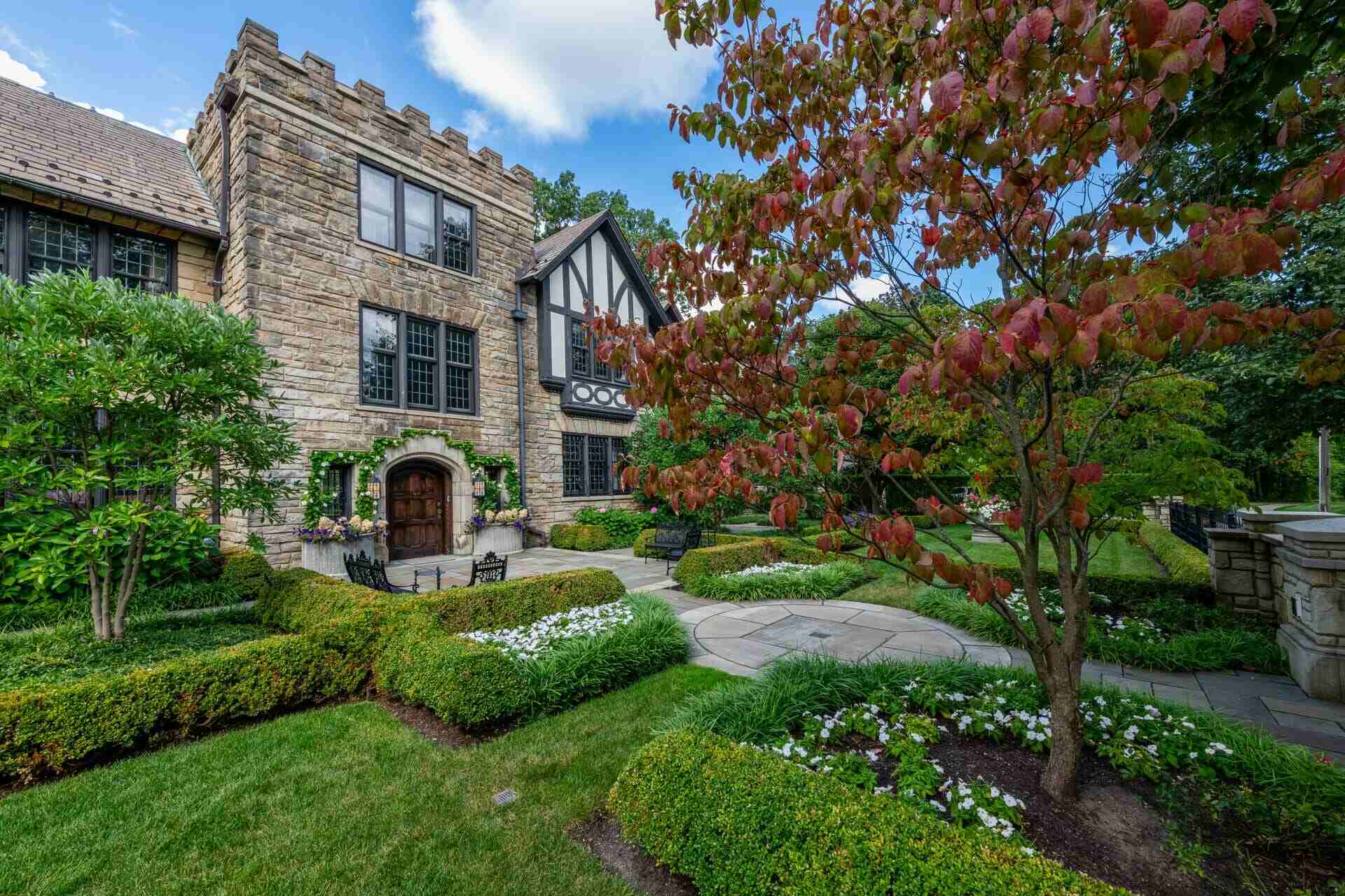 Charming garden pathway lined with vibrant plantings at a historic home in Novelty, OH-1